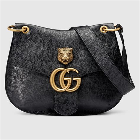 gucci purse emblem